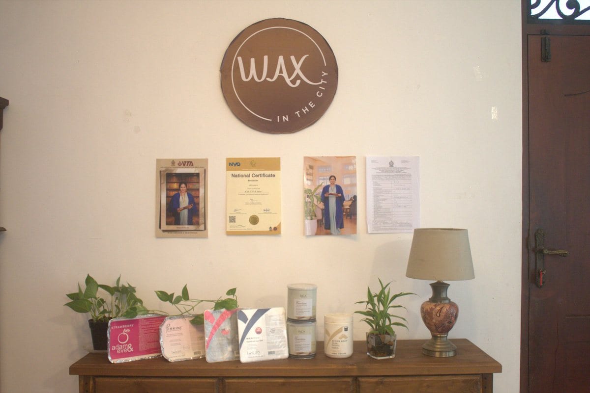 Wax In The City brand wall styled inside the studio
