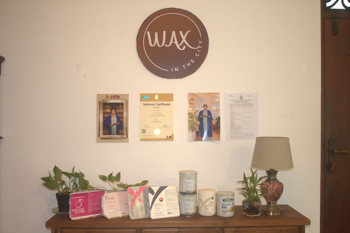 Detail of the branded studio wall and lighting