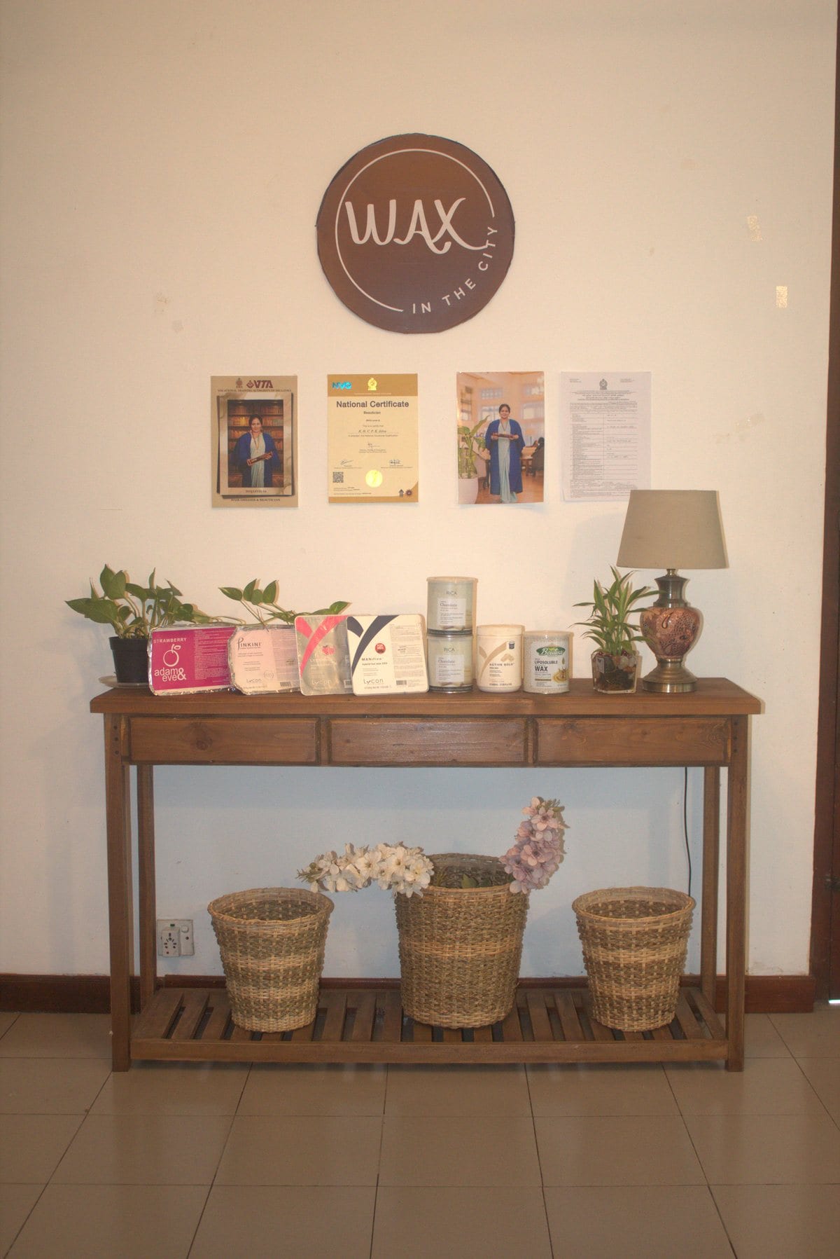 Premium wax and skin care products on the studio shelf