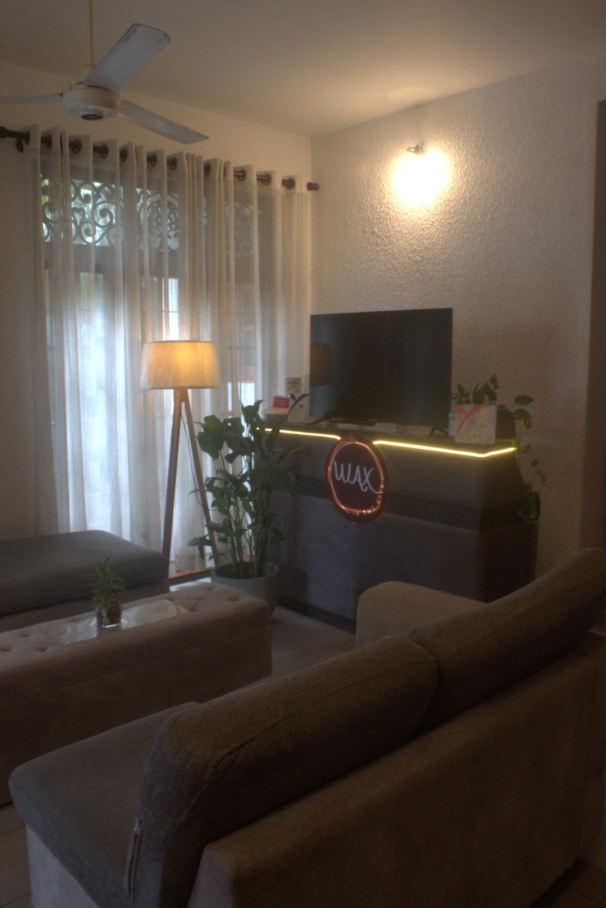 Reception corner with soft lighting and calm decor