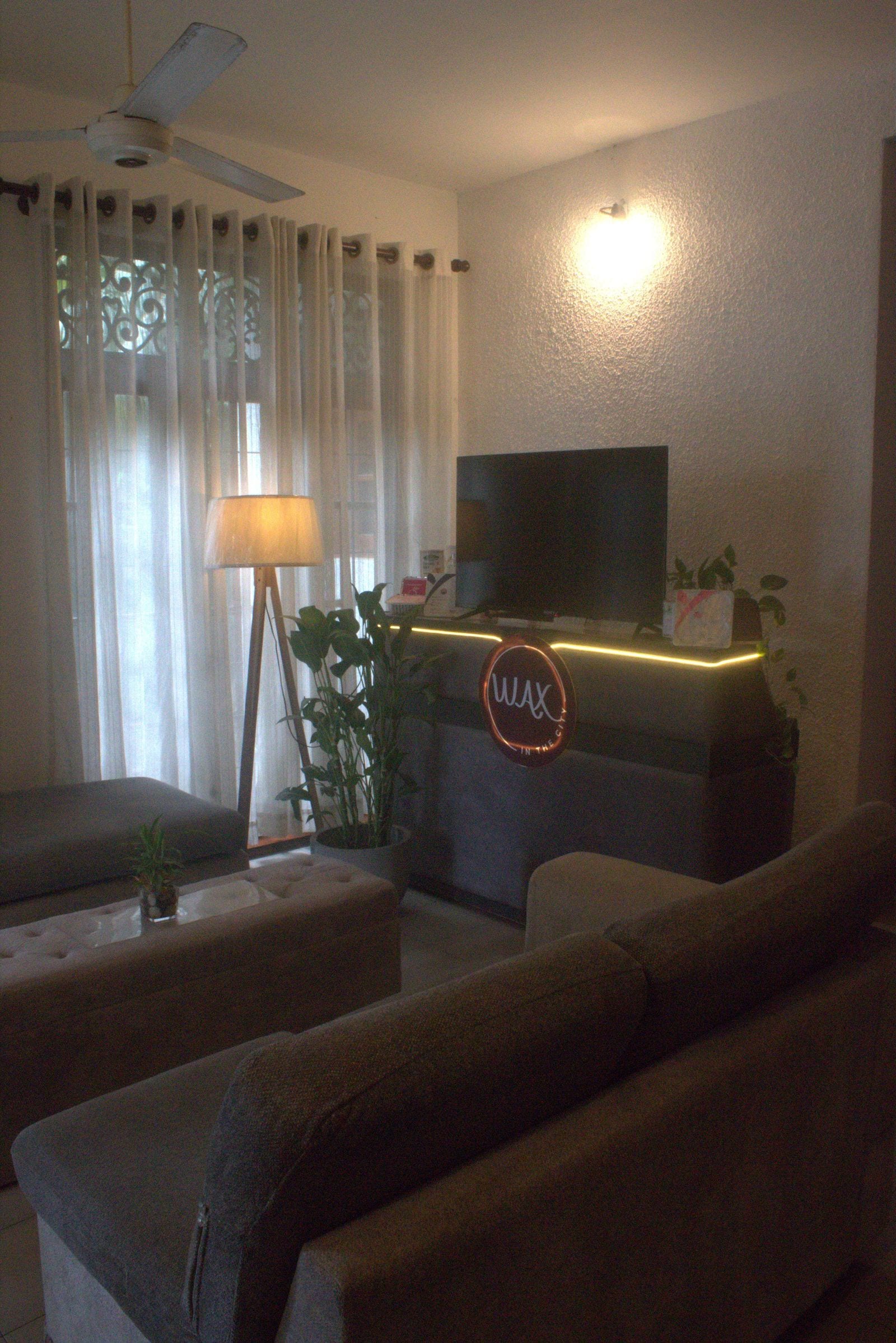 Warm private reception lounge at the Battaramulla studio